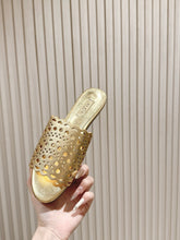 ALAIA PERFORATED SLIDE SANDALS 25S IN LIGHT GOLD LAMBSKIN